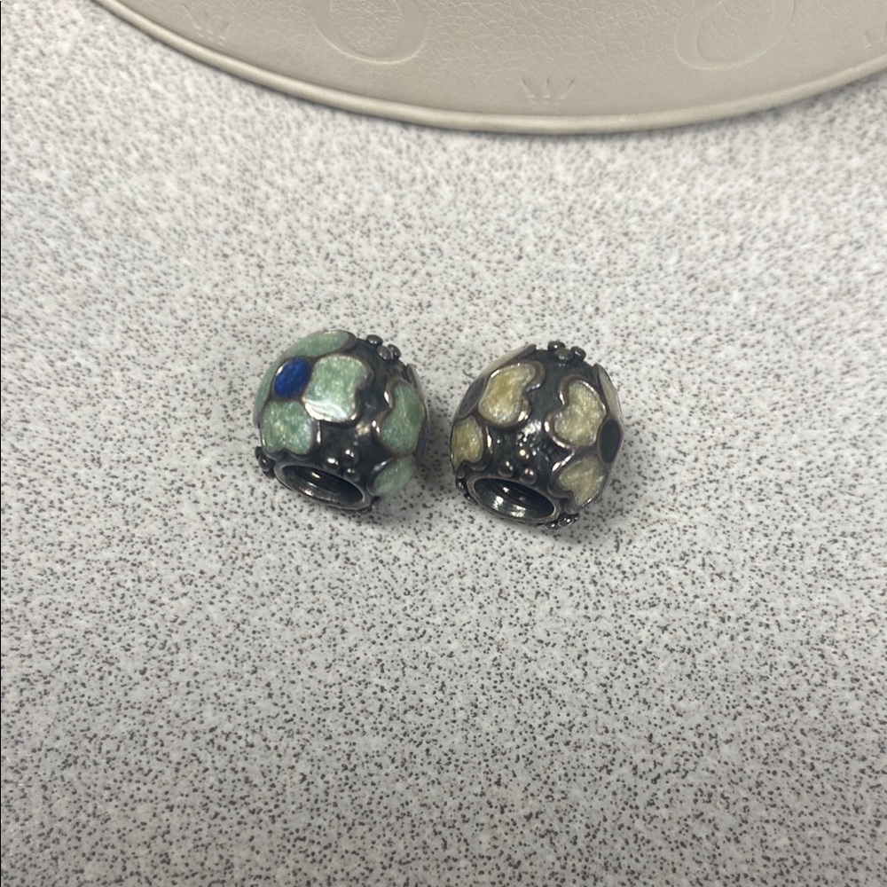 Pair of Pandora beads yellow and green